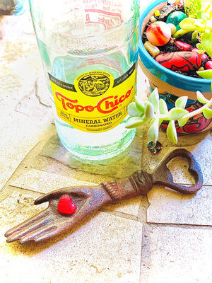 Kitchen, bottle opener, heart in hand