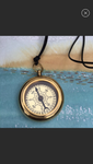 Jewelry, brass compass on leather